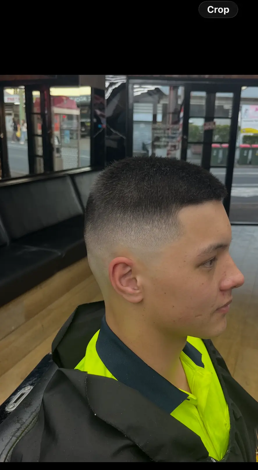Short buzz cut with a clean skin fade