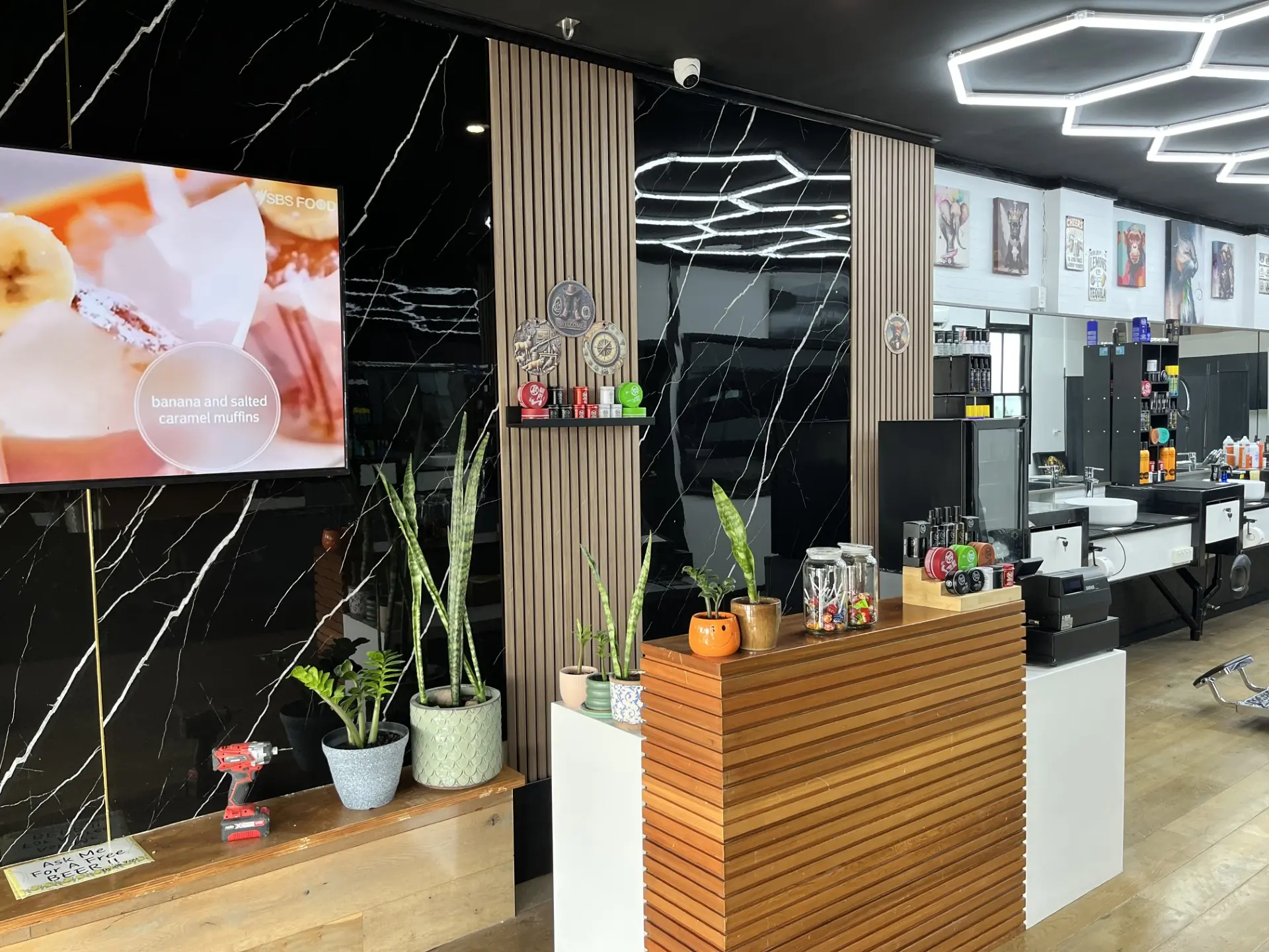 Warm interior of Atlas Barbershop